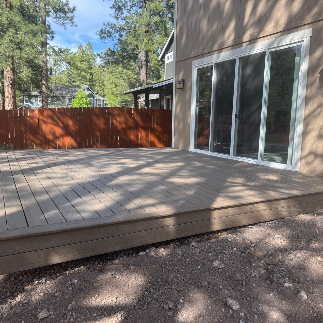 Large Composite Deck with Wooden Fence